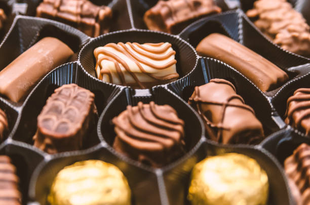 istock Chocolate candy in the box. Chocolate sweets 872085746