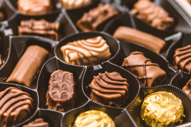 istock Chocolate candy in the box. Chocolate sweets 872085758