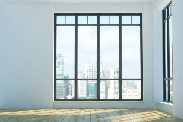 istock Bright unfurnished interior with city view 872089650