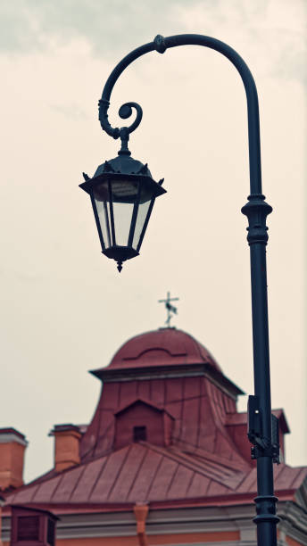 Street lantern and ancient roof in Saint Peterburg, Russia