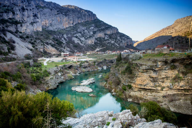 istock canyon turquoise river among mountains and blue sky 872101324
