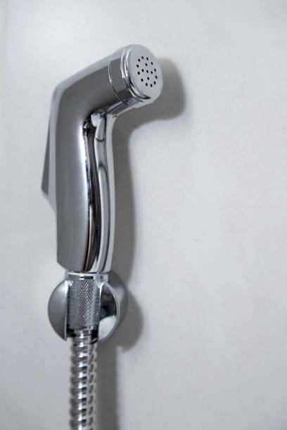 istock Bidet shower on the wall 872103994