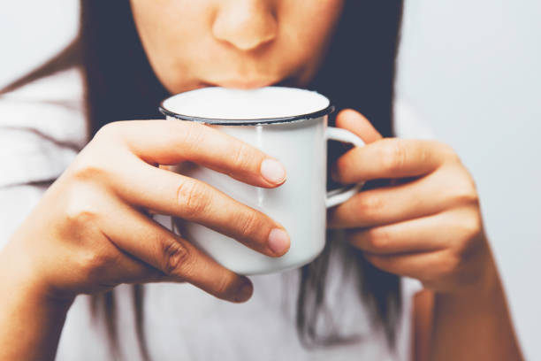 istock Women drinks milk 872105034