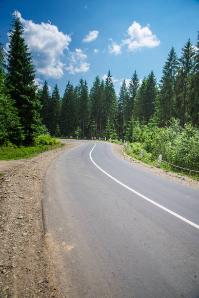istock road in the Carpathian Mountains 872107912
