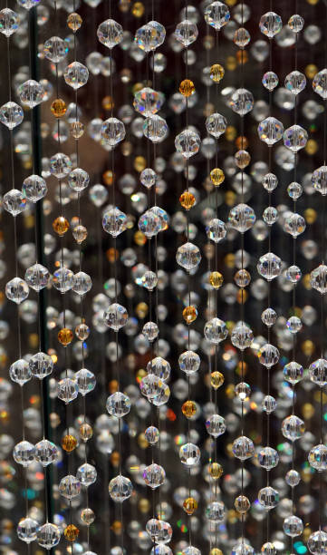 istock Swarovski crystal beaded curtain. Bead curtains pattern, texture background 872119258