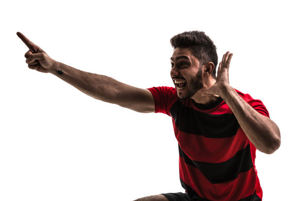 istock Fan / Sport Player on red and black uniform celebrating on white background 872119838