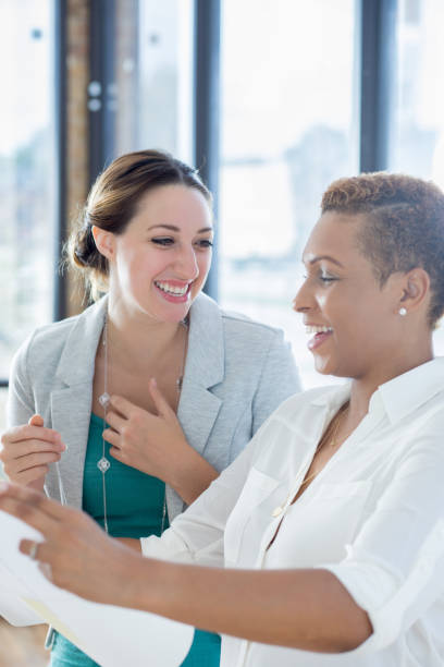 istock Cheerful female architects enjoy their current project 872121368