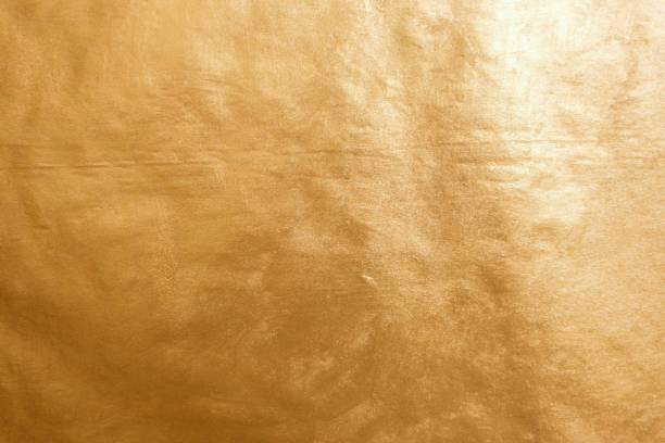 istock Golden textured background close up 872132410