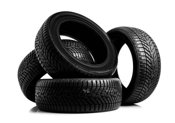 istock Winter tires on a white background 872140146