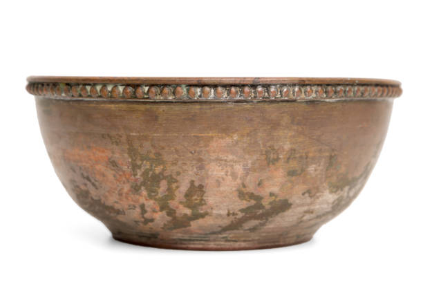 istock Old vintage copper bowl handmade isolated on white. 872150678