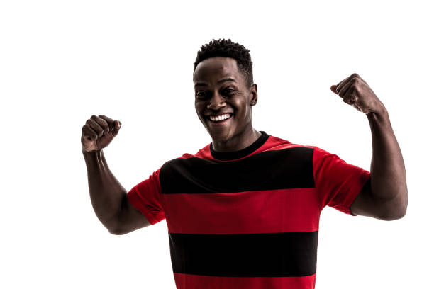 istock Fan / Sport Player on red and black uniform celebrating on white background 872153836