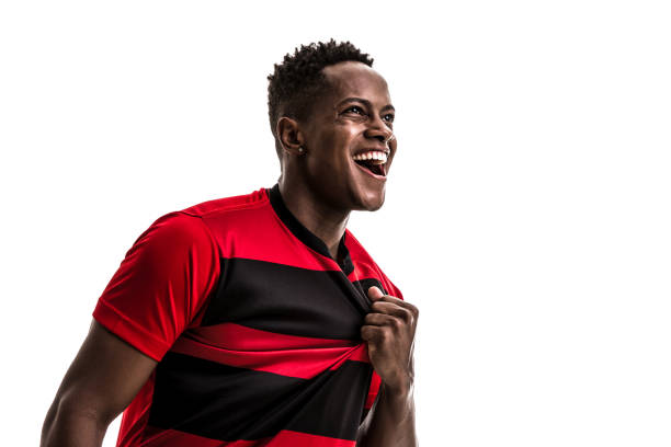 istock Fan / Sport Player on red and black uniform celebrating on white background 872153882