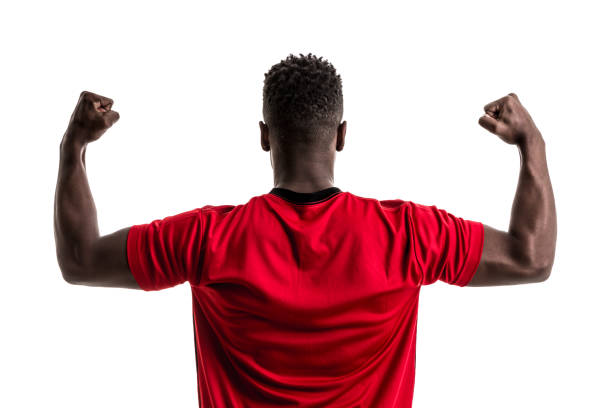 istock Fan / Sport Player on red and black uniform celebrating on white background 872153896
