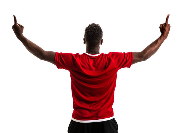 istock Fan / Sport Player on red and black uniform celebrating on white background 872153902