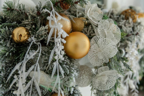 istock Christmas tree with white and gold decorations 872154800