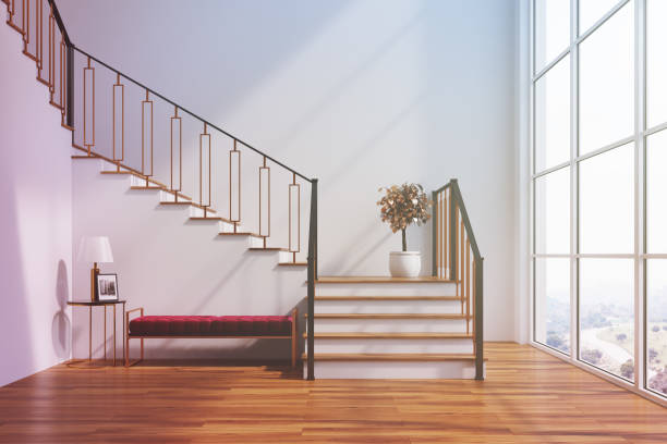istock White living room, stairs, red bench toned 872155826