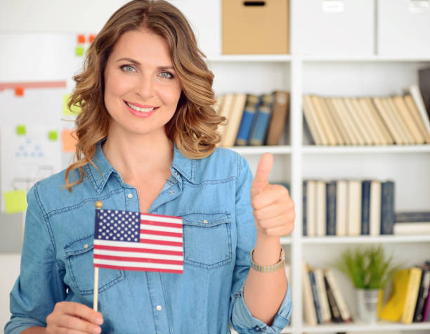 istock blonde woman working in the office 872176976