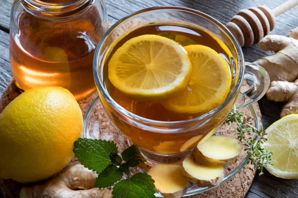 istock A cup of tea with ginger, lemon, melissa and honey 872177686