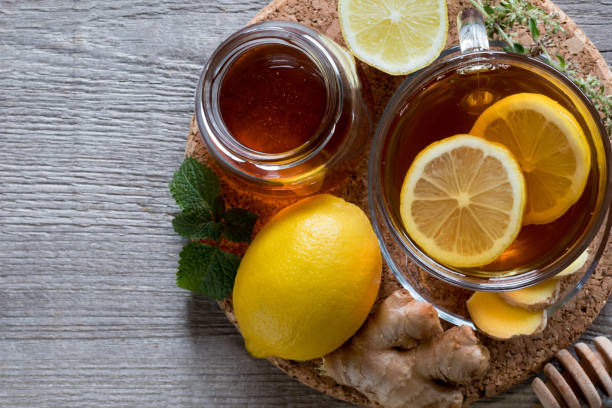 istock A cup of tea with ginger root, lemon, melissa and honey 872177698