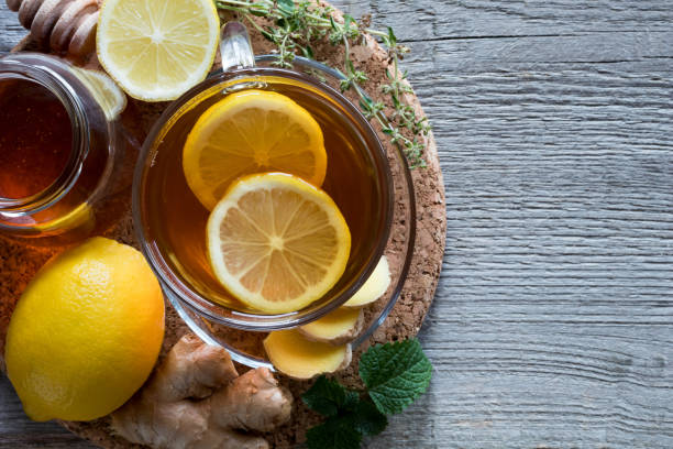 istock A cup of tea with ginger root, lemon, melissa and honey 872177722