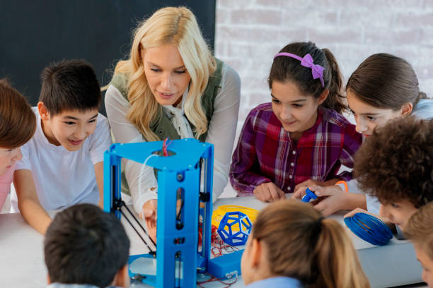 istock Kids Learning 3D Printing In School 872178598