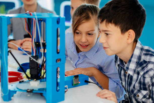 istock Kids Learning 3D Printing In School 872178696