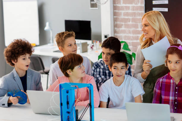 istock Kids Learning 3D Printing In School 872178726