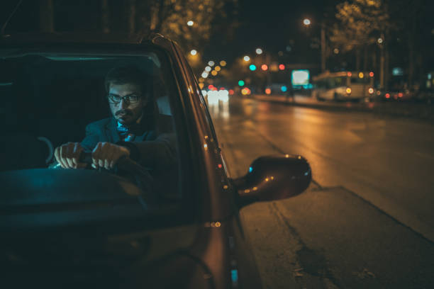 istock Businessman driving car 872178826