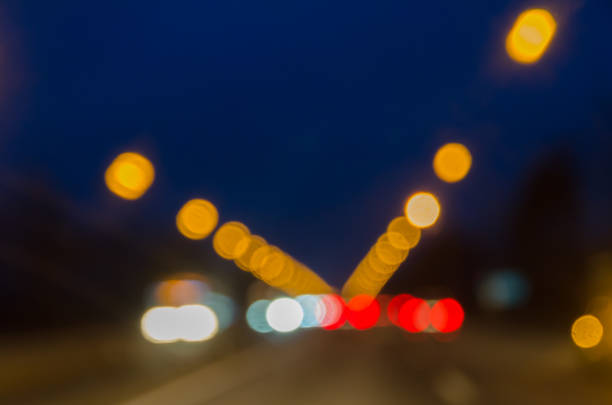istock Evening direct road. Bokeh. Background. 872181980