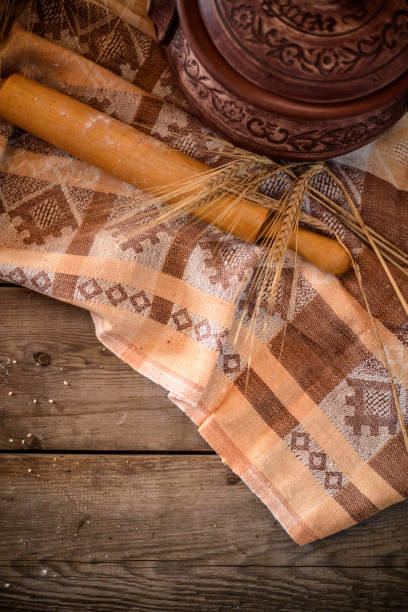 istock Bakery products and rolling pin on a wooden table. Rustic concept. Top view. Copy space 872186784