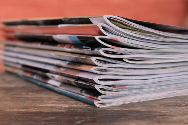 istock Magazines on the wooden table 872187032