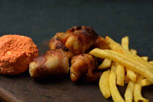 istock Kebab Rolled in Bacon with Fries 872188808