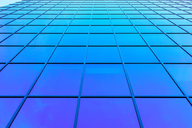 istock Windows of modern futuristic glass skyscraper 872191112