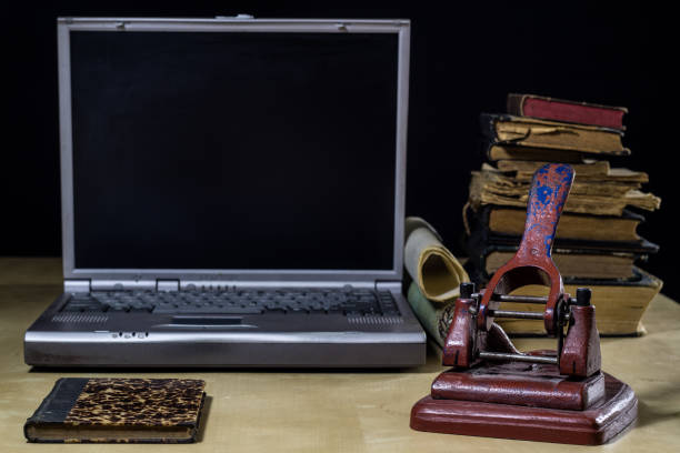 istock architect's table, laptop, calculator on the table. Plans, projects and notepad on the architect's table. 872191520