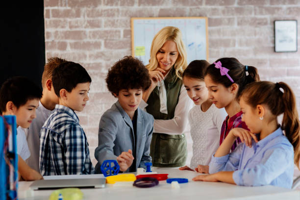 istock Kids Learning 3D Printing In School 872192454