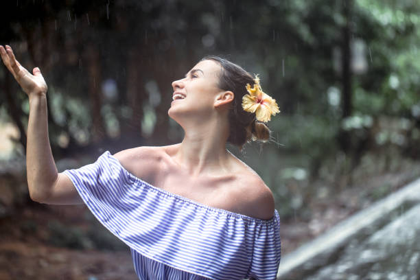 istock girl happy rain 872196140