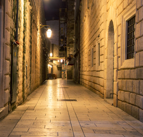 istock alleyway dubrovnik at night 872213882