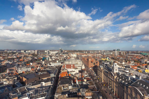 istock Amsterdam skyline from public Damrak square 872214878