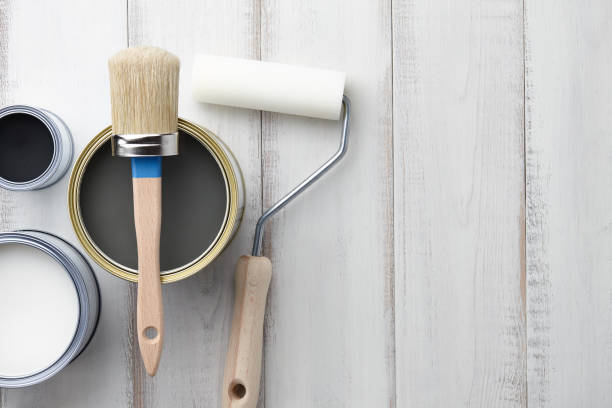 istock Different painting supplies on white wooden table 872231976