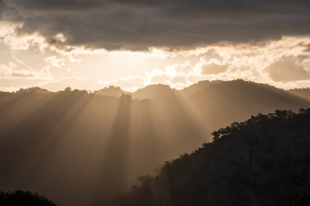 istock Sun rays peaking over a Southern Highland's mountain range at sunset 872235590