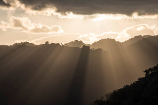 istock Sun rays peaking over a Southern Highland's mountain range at sunset 872235592