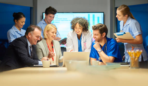 istock pharmaceutical rep with medical team 872235692