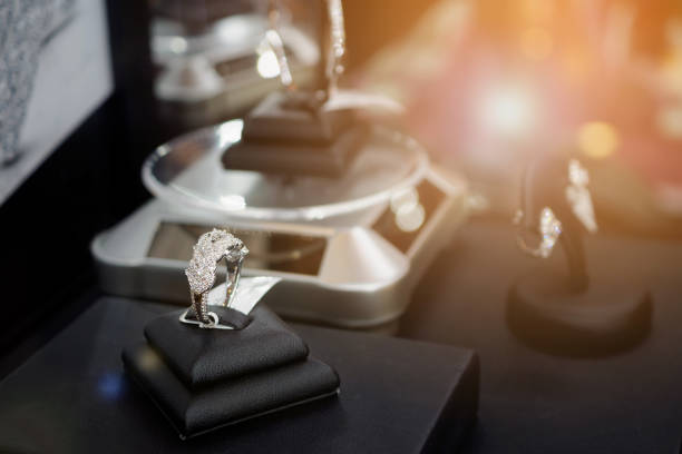 istock Diamond rings in jewelry luxury store window display 872239376