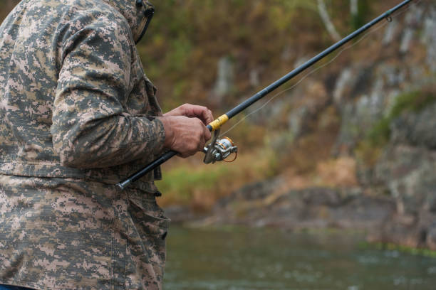 istock Fisherman at the Altai river 872243496