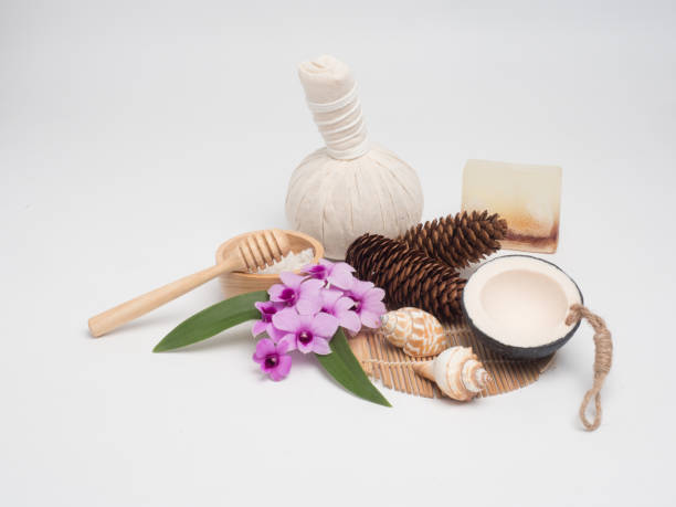 istock Spa set ,candle,coconut,flower,soap ,massage, with white background. Relaxing time aromatherapy . 872249670
