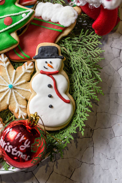 istock Christmas cookies on wooden table 872249830