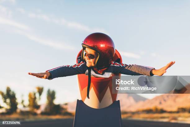 Young Stunt Boy And Human Cannon Ball Stock Photo - Download Image Now - Child, Anticipation, Opportunity