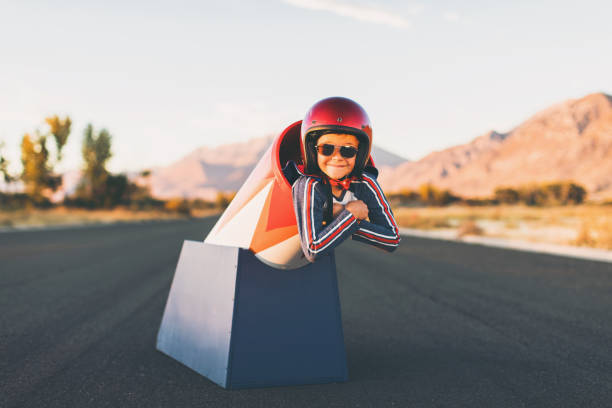istock Young Stunt Boy and Human Cannon Ball 872250700
