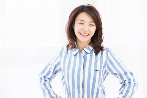 istock woman in night clothes 872257064