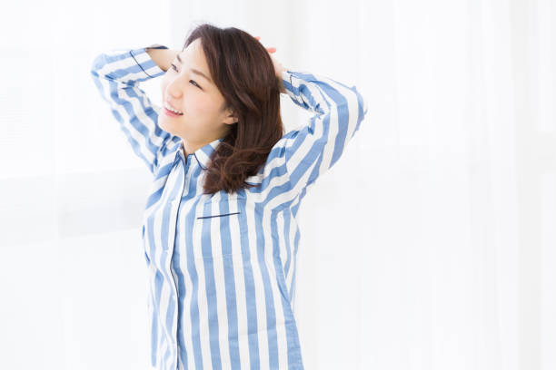 istock woman in night clothes 872257072